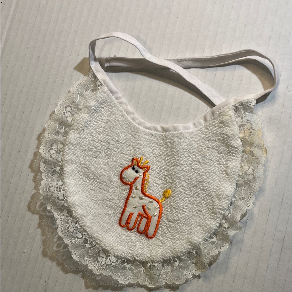 Adorable White Baby Bib With Giraffe Design